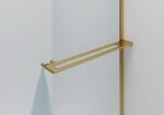 CURVY WALK-IN SHOWER WITH TOWEL RAIL - CURVED - ANTI-LIMESCALE TREATMENT - REVERSIBLE - 8MM SAFETY GLASS - 100X200CM - BRUSHED GOLD - CLEAR GLASS - Image 2